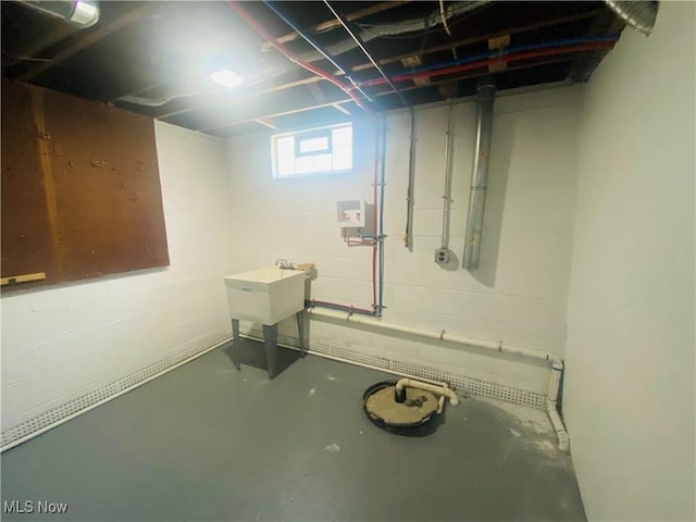 109 Avalon Ave, Bedford, OH 44146 - basement featuring a sink and concrete block wall
