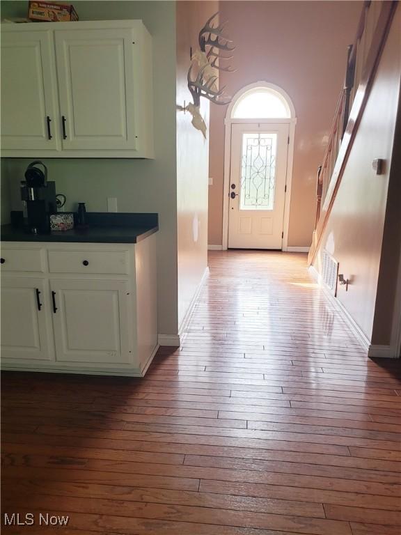 1310 Oxbow Rd, Belpre, OH 45714 - kitchen featuring dark countertops and hardwood / wood-style floors