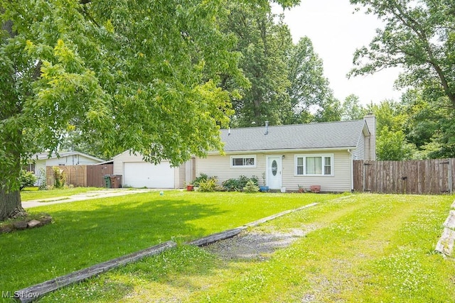 35109 Elm Rd, Grafton, OH 44044 - view of front of house with concrete driveway, an attached garage, and a chimney