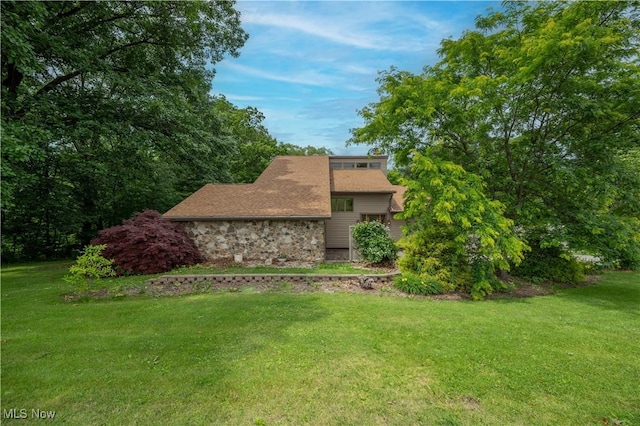 3355 Waterford Rd, New Waterford, OH 44445 - view of front of home featuring a front lawn and stone siding