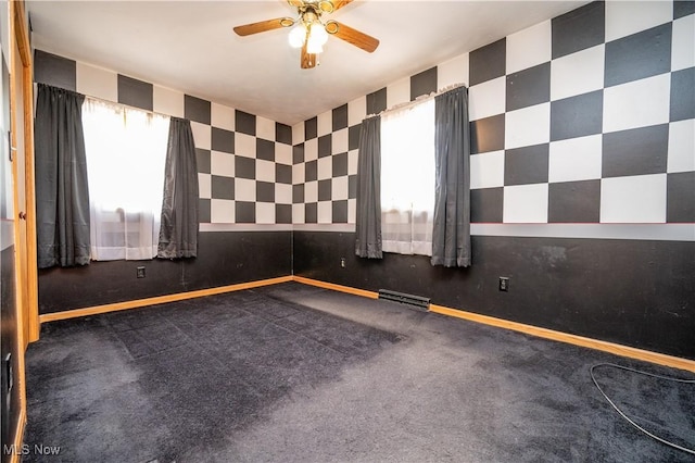 3355 Waterford Rd, New Waterford, OH 44445 - spare room featuring a ceiling fan and wallpapered walls