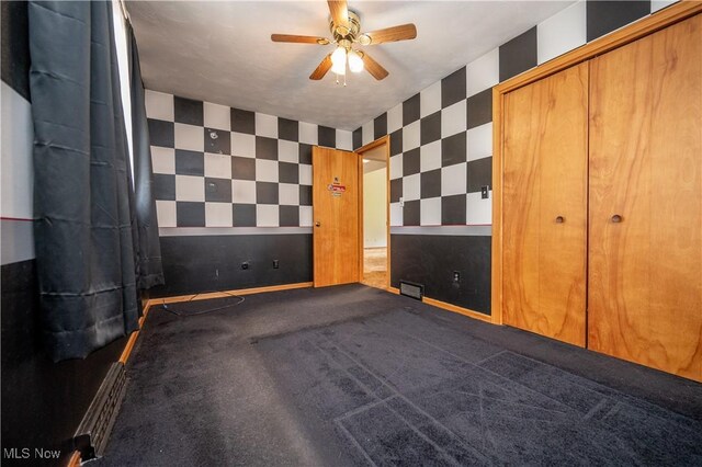 3355 Waterford Rd, New Waterford, OH 44445 - unfurnished bedroom with wallpapered walls and carpet