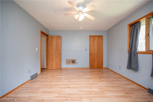 3355 Waterford Rd, New Waterford, OH 44445 - unfurnished room featuring light wood finished floors and ceiling fan