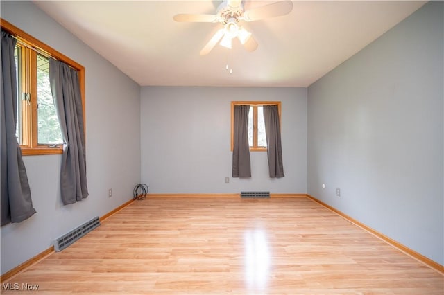 3355 Waterford Rd, New Waterford, OH 44445 - unfurnished room with light wood-style flooring and ceiling fan