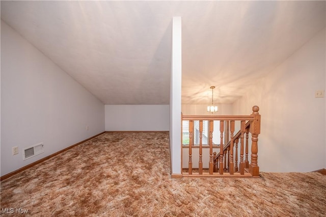 3355 Waterford Rd, New Waterford, OH 44445 - bonus room featuring a chandelier, carpet flooring, and vaulted ceiling