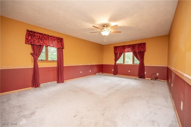 3355 Waterford Rd, New Waterford, OH 44445 - carpeted spare room with ceiling fan and baseboards