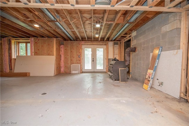 3355 Waterford Rd, New Waterford, OH 44445 - below grade area featuring french doors