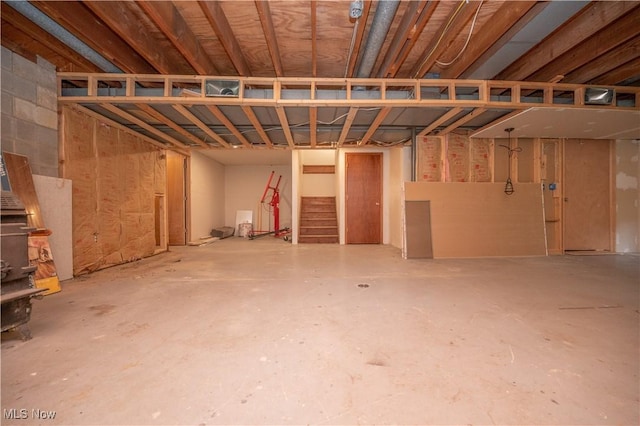 3355 Waterford Rd, New Waterford, OH 44445 - unfinished basement featuring stairs