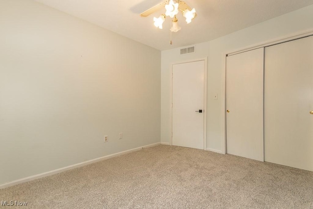 3 Meadowlawn Dr Unit 13, Mentor, OH 44060 - unfurnished bedroom with carpet flooring, a closet, and ceiling fan