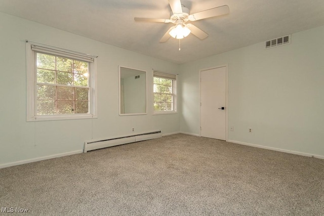 3 Meadowlawn Dr Unit 13, Mentor, OH 44060 - spare room with baseboard heating, carpet, and a ceiling fan