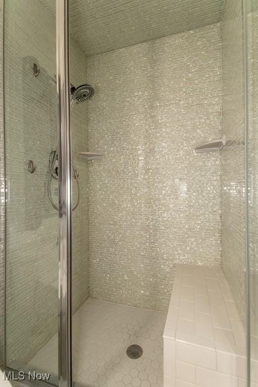 3 Meadowlawn Dr Unit 13, Mentor, OH 44060 - full bathroom featuring a shower stall and tile patterned flooring