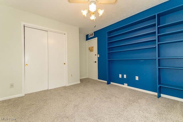 3 Meadowlawn Dr Unit 13, Mentor, OH 44060 - unfurnished bedroom with carpet, a closet, and a ceiling fan
