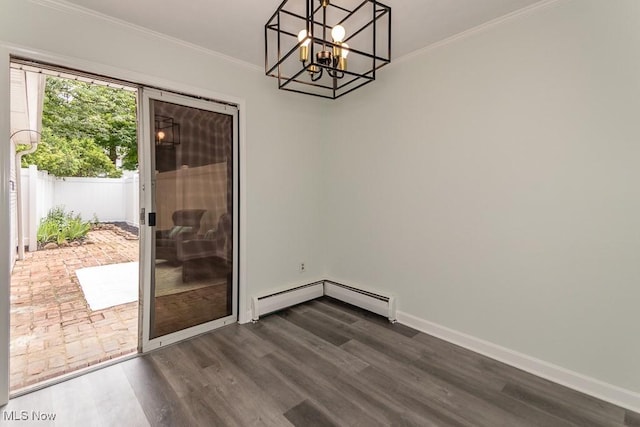 3 Meadowlawn Dr Unit 13, Mentor, OH 44060 - unfurnished dining area featuring dark wood-type flooring, a chandelier, crown molding, and baseboard heating