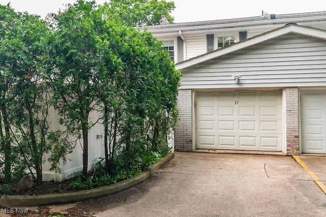 3 Meadowlawn Dr Unit 13, Mentor, OH 44060 - view of side of home featuring brick siding