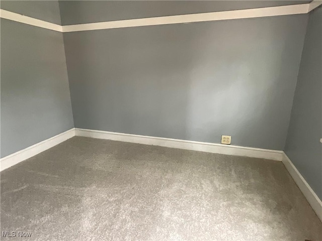 4313 Warner Rd, Cleveland, OH 44105 - carpeted empty room with baseboards