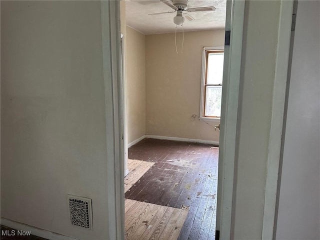 816 W 22nd St, Lorain, OH 44052 - unfurnished room featuring ceiling fan and dark wood-style flooring