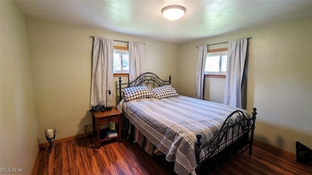 6323 Olive Ave, North Ridgeville, OH 44039 - bedroom with multiple windows and wood finished floors