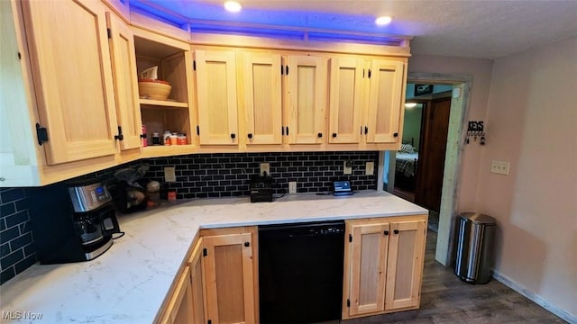 6323 Olive Ave, North Ridgeville, OH 44039 - kitchen with dishwasher, tasteful backsplash, light brown cabinetry, light stone countertops, and dark wood-type flooring