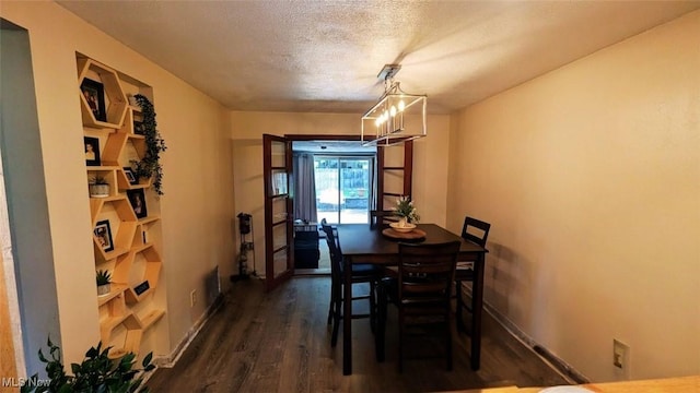 6323 Olive Ave, North Ridgeville, OH 44039 - dining area with dark wood-type flooring and baseboards