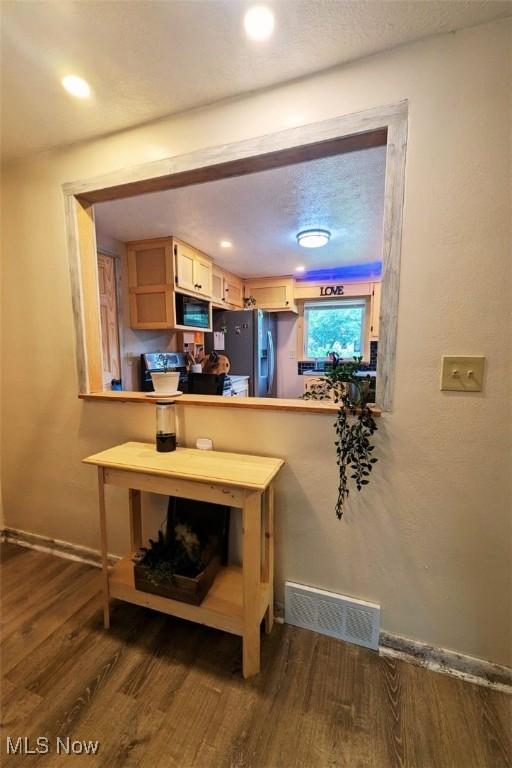 6323 Olive Ave, North Ridgeville, OH 44039 - kitchen featuring stainless steel fridge, dark wood finished floors, and recessed lighting