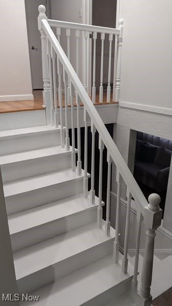7957 Pamela Dr, North Royalton, OH 44133 - stairs featuring concrete flooring
