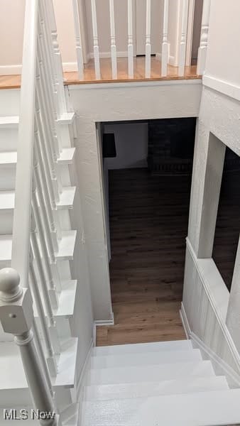 7957 Pamela Dr, North Royalton, OH 44133 - stairway featuring wood finished floors
