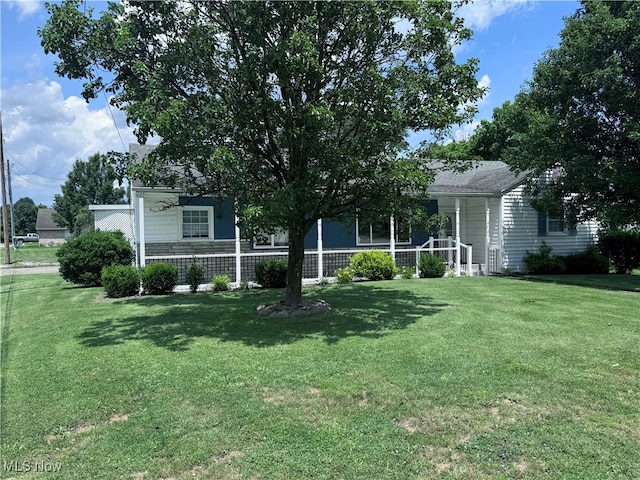 1605 Gihon Rd, Parkersburg, WV 26101 - view of front facade featuring a front yard and covered porch