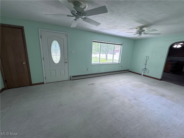 1605 Gihon Rd, Parkersburg, WV 26101 - entryway with baseboard heating, ceiling fan, carpet floors, and a textured ceiling