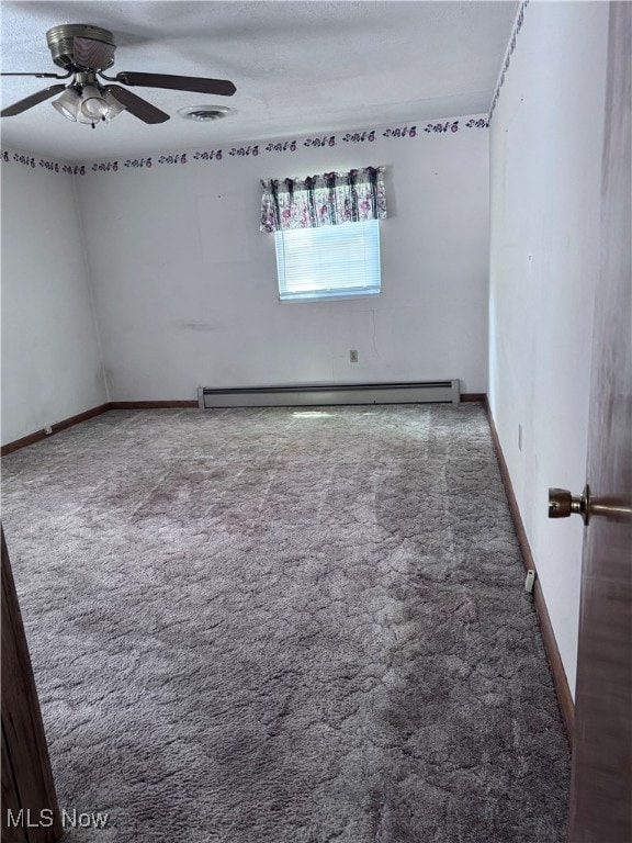 1605 Gihon Rd, Parkersburg, WV 26101 - unfurnished room featuring carpet, baseboard heating, and ceiling fan