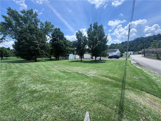 1605 Gihon Rd, Parkersburg, WV 26101 - view of grassy yard featuring a storage shed