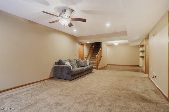 1549 Galaxy Dr, Mogadore, OH 44260 - living area with stairway, carpet flooring, a ceiling fan, and recessed lighting