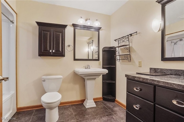 1549 Galaxy Dr, Mogadore, OH 44260 - bathroom featuring toilet and tile patterned flooring