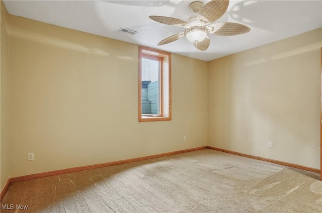 1549 Galaxy Dr, Mogadore, OH 44260 - carpeted empty room featuring baseboards and ceiling fan