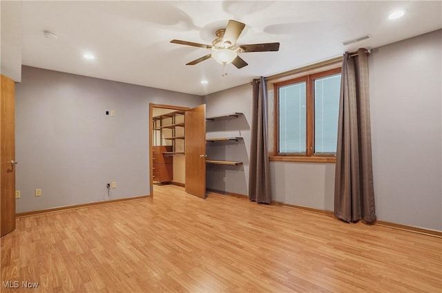 1549 Galaxy Dr, Mogadore, OH 44260 - unfurnished bedroom with light wood-style flooring, recessed lighting, and ceiling fan