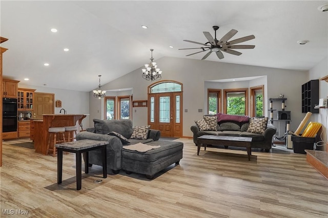 1549 Galaxy Dr, Mogadore, OH 44260 - living area with a chandelier, ceiling fan, light wood finished floors, recessed lighting, and high vaulted ceiling