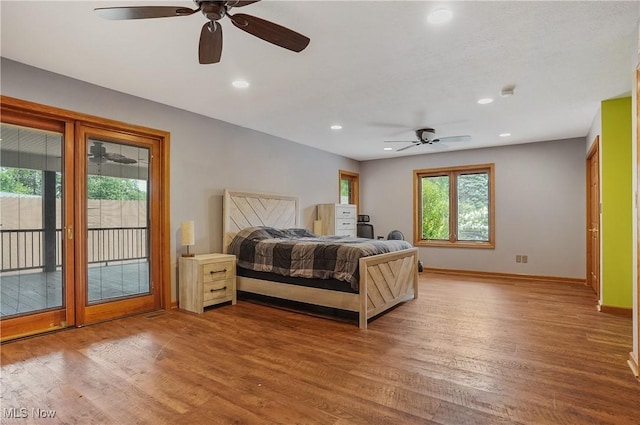 1549 Galaxy Dr, Mogadore, OH 44260 - bedroom featuring access to exterior, wood finished floors, recessed lighting, and ceiling fan