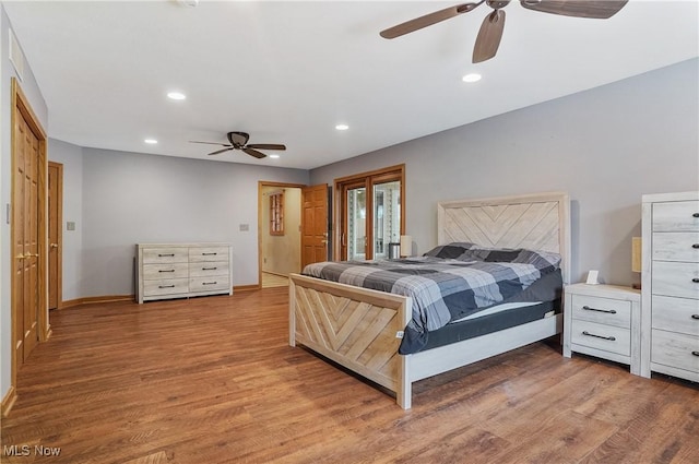 1549 Galaxy Dr, Mogadore, OH 44260 - bedroom featuring wood finished floors, recessed lighting, access to exterior, and a ceiling fan