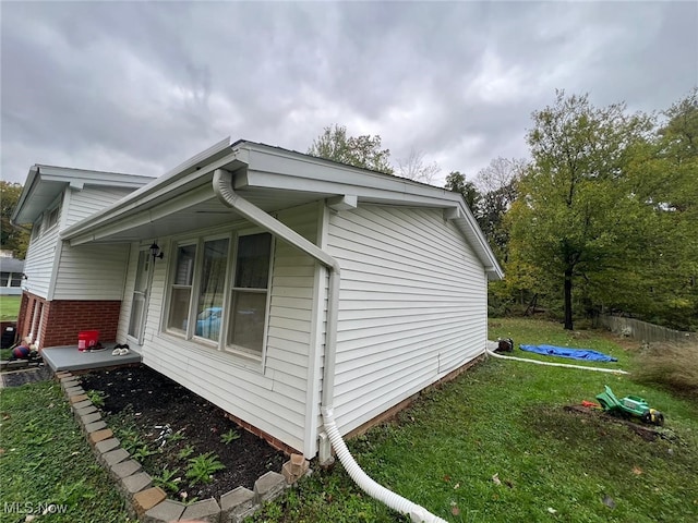 28842 Oring Rd, North Olmsted, OH 44070 - view of home's exterior with a lawn