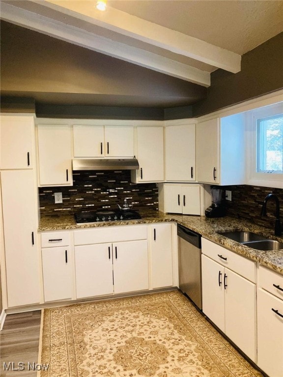 28842 Oring Rd, North Olmsted, OH 44070 - kitchen featuring dishwasher, black gas cooktop, under cabinet range hood, beamed ceiling, and backsplash