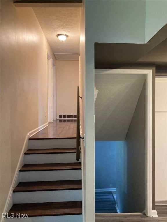 28842 Oring Rd, North Olmsted, OH 44070 - stairs featuring baseboards