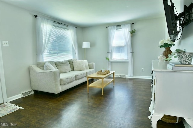 437 Hazel St, Girard, OH 44420 - living room with dark wood-style floors and baseboards