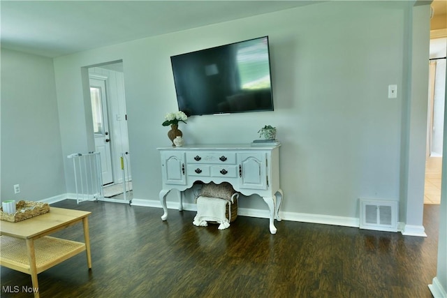 437 Hazel St, Girard, OH 44420 - living room featuring dark wood-style floors and baseboards