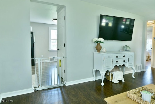 437 Hazel St, Girard, OH 44420 - living area with dark wood finished floors