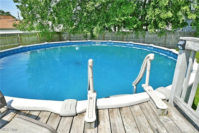 437 Hazel St, Girard, OH 44420 - view of swimming pool with a fenced backyard and a deck