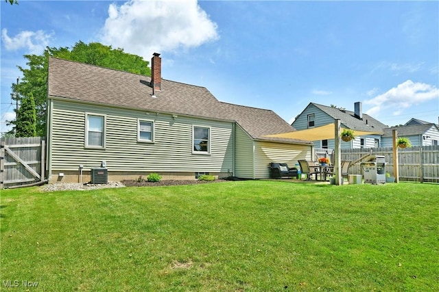 437 Hazel St, Girard, OH 44420 - rear view of house featuring a chimney and a shingled roof