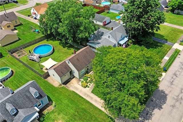 437 Hazel St, Girard, OH 44420 - aerial perspective of suburban area featuring a pool