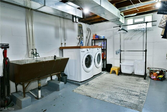 437 Hazel St, Girard, OH 44420 - laundry room with washer and clothes dryer and concrete block wall