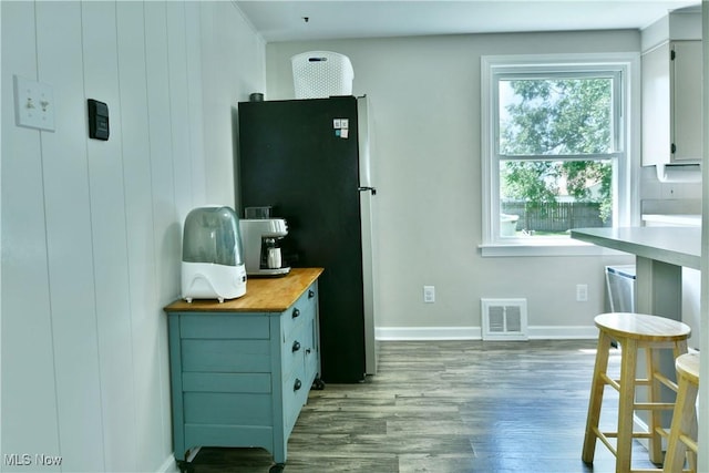 437 Hazel St, Girard, OH 44420 - kitchen featuring freestanding refrigerator and wood finished floors