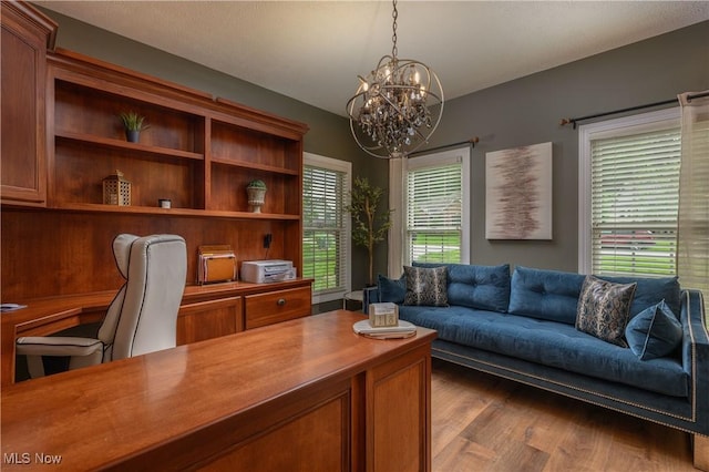 3595 Vineyard Ave NW, Canton, OH 44708 - office featuring a chandelier and wood finished floors