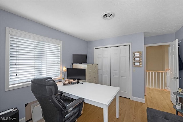 4613 Compass Rose Unit 11, Vermilion, OH 44089 - home office with light wood finished floors and baseboards